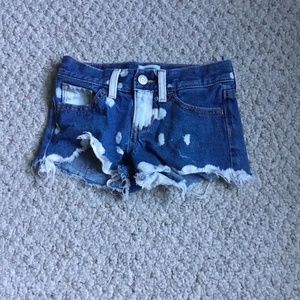 Bleach patch shorts with fringe